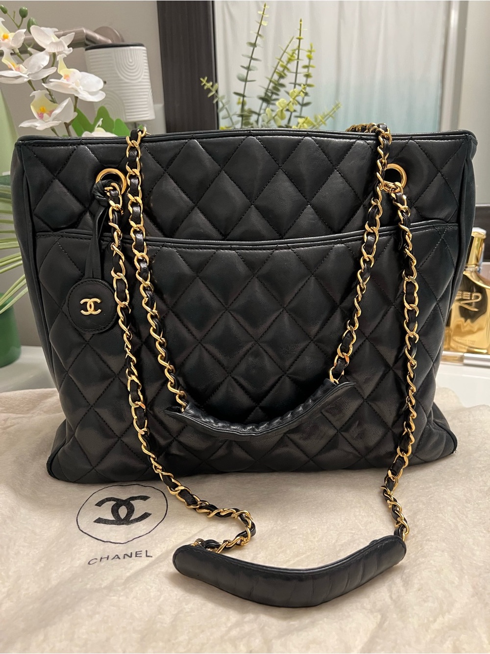 CHANEL Black Quilted Lambskin Shoulder Bag with Gold Chain Detail